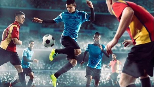 Een foto van een voetbalspeler die de bal omhoog speelt.